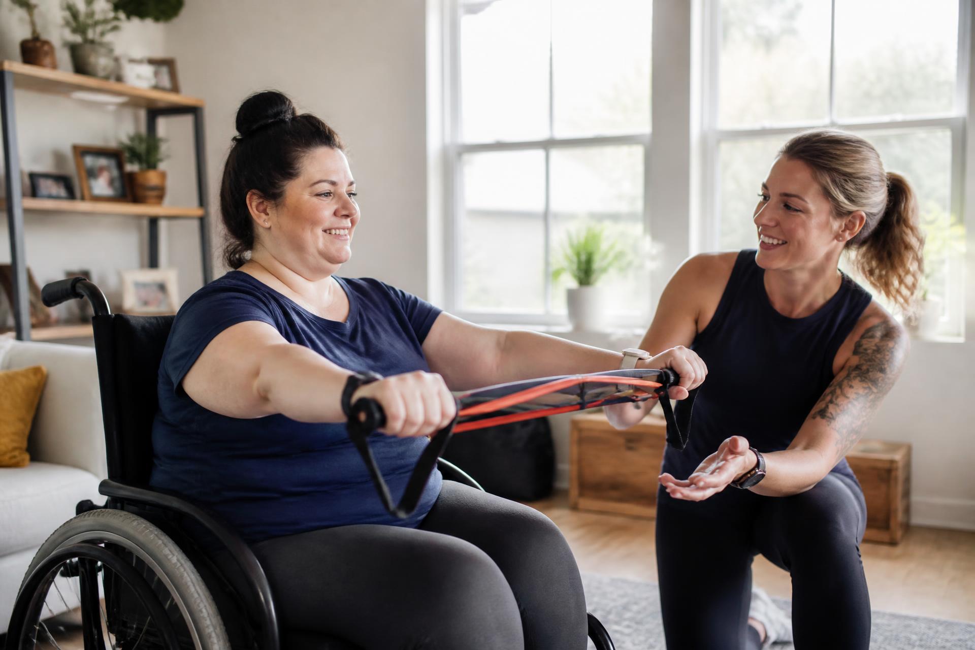 An adaptive personal trainer coaching a client who uses a wheelchair with resistance bands at home